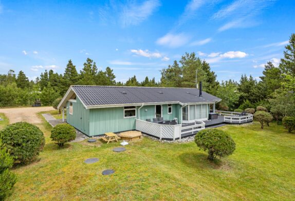 Lad feriefreden sænke sig over jer i dette skønne sommerhus