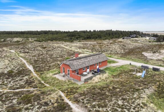 Reetgedecktes Ferienhaus mit Sauna, Kamin und Whirlpool