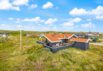 Strandnahes Ferienhaus mit geschlossener Terrasse (Bild  1)