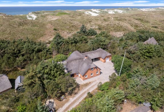 Strandnahes Reetdachhaus für 12 Personen mit Sauna