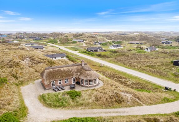 Reetgedecktes Ferienhaus mit Panoramablick auf die Dünen