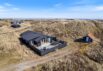Dejligt sommerhus med lukket terrasse – tæt på Vesterhavet (billede 1)