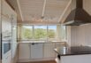 Hus med lukket terrasse, carport og flot brændeovn (billede 10)
