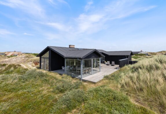 Modernes Ferienhaus mit Panoramablick direkt in den Dünen