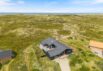 Flot feriehus med panoramaudsigt og sauna kun 250 m fra stranden (billede 1)