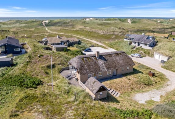 Strandnahes Reetdachhaus mit Wellnessbereich