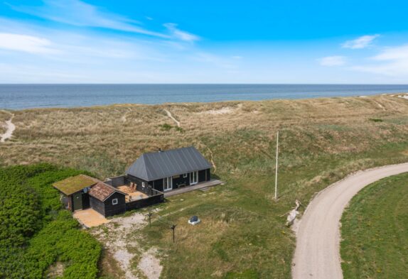 Einzigartiges Ferienhaus inklusive Wellenrauschen – 50 m Strand