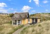Charmantes Ferienhaus in ruhiger, strandnaher Lage (Bild  1)