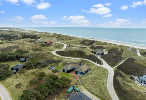 Reetgedecktes strandnahes Ferienhaus mit Sauna