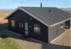 Dejligt sommerhus med brændeovn og fjordudsigt i Thorsminde (billede 1)