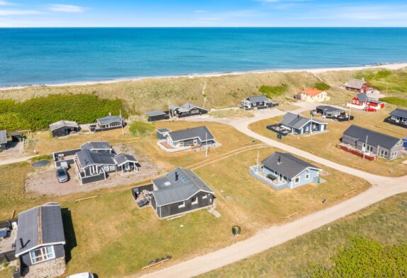 Strandnahes Sommerhaus mit Wintergarten – Hunde erlaubt