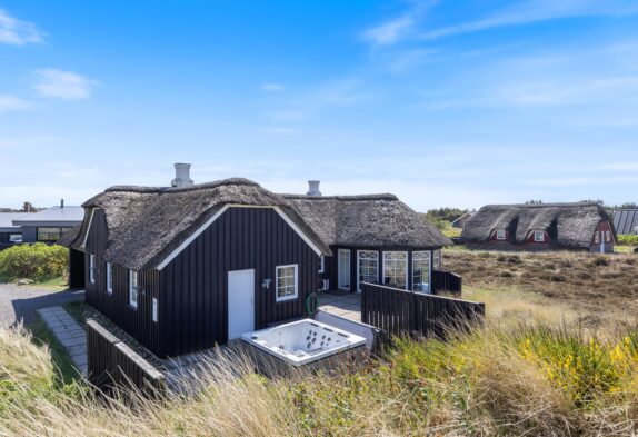 Feriehus i topklasse med udendørs spa og udebruser