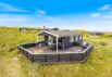 Skønt sommerhus med lukket terrasse på flot naturgrund (billede 1)