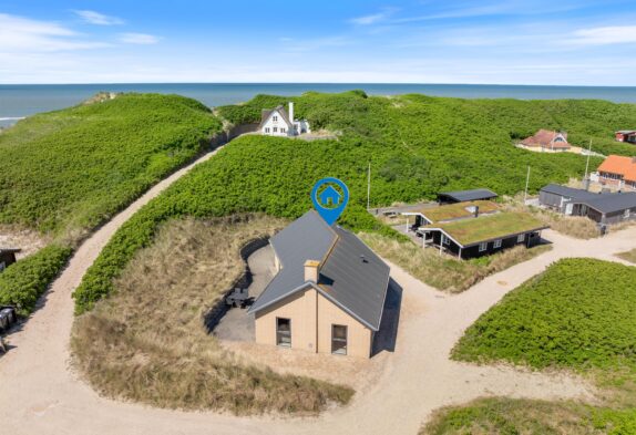 Schönes Ferienhaus auf einem Dünengrundstück direkt am Meer